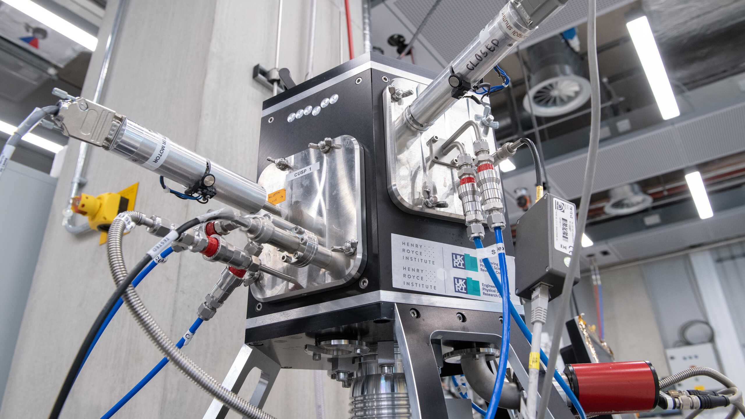 A complex scientific instrument in a laboratory.
