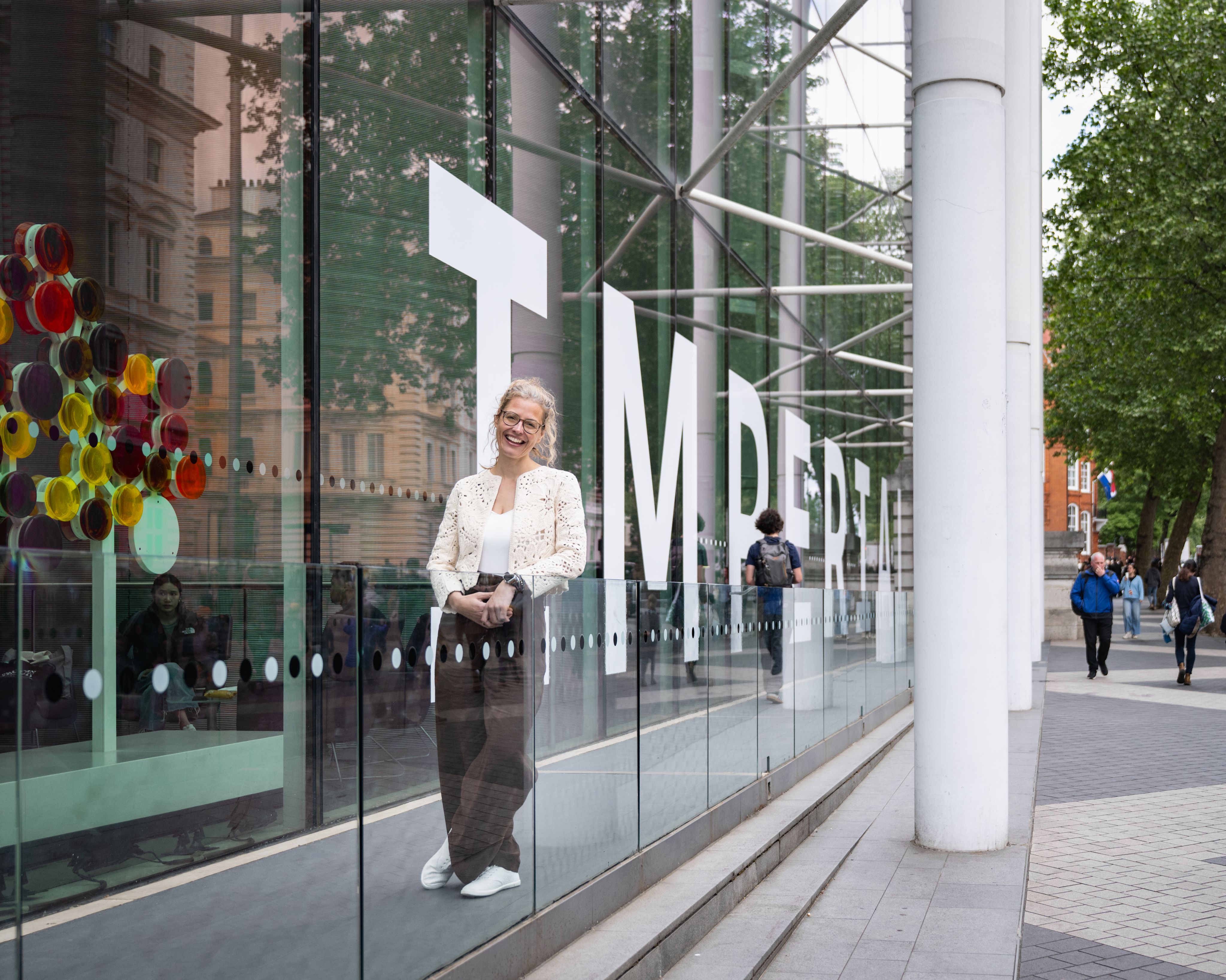 Sabine standing in front of the Imperial sign outside Main Reception on Great Exhibition Road.