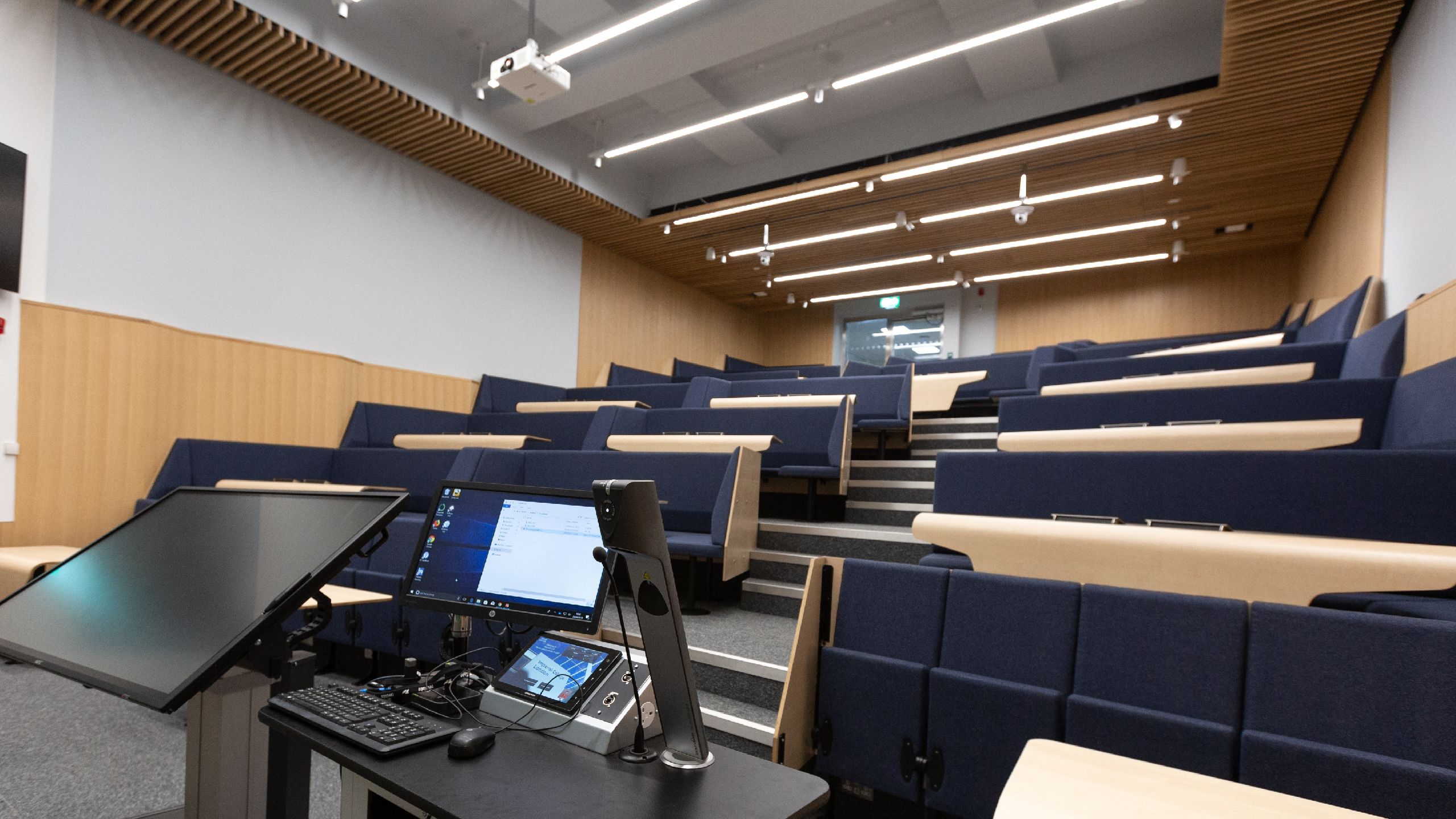 The newly renovated Blackett 113 lecture theatre, seen from the view of the lectern up to the tiered seating