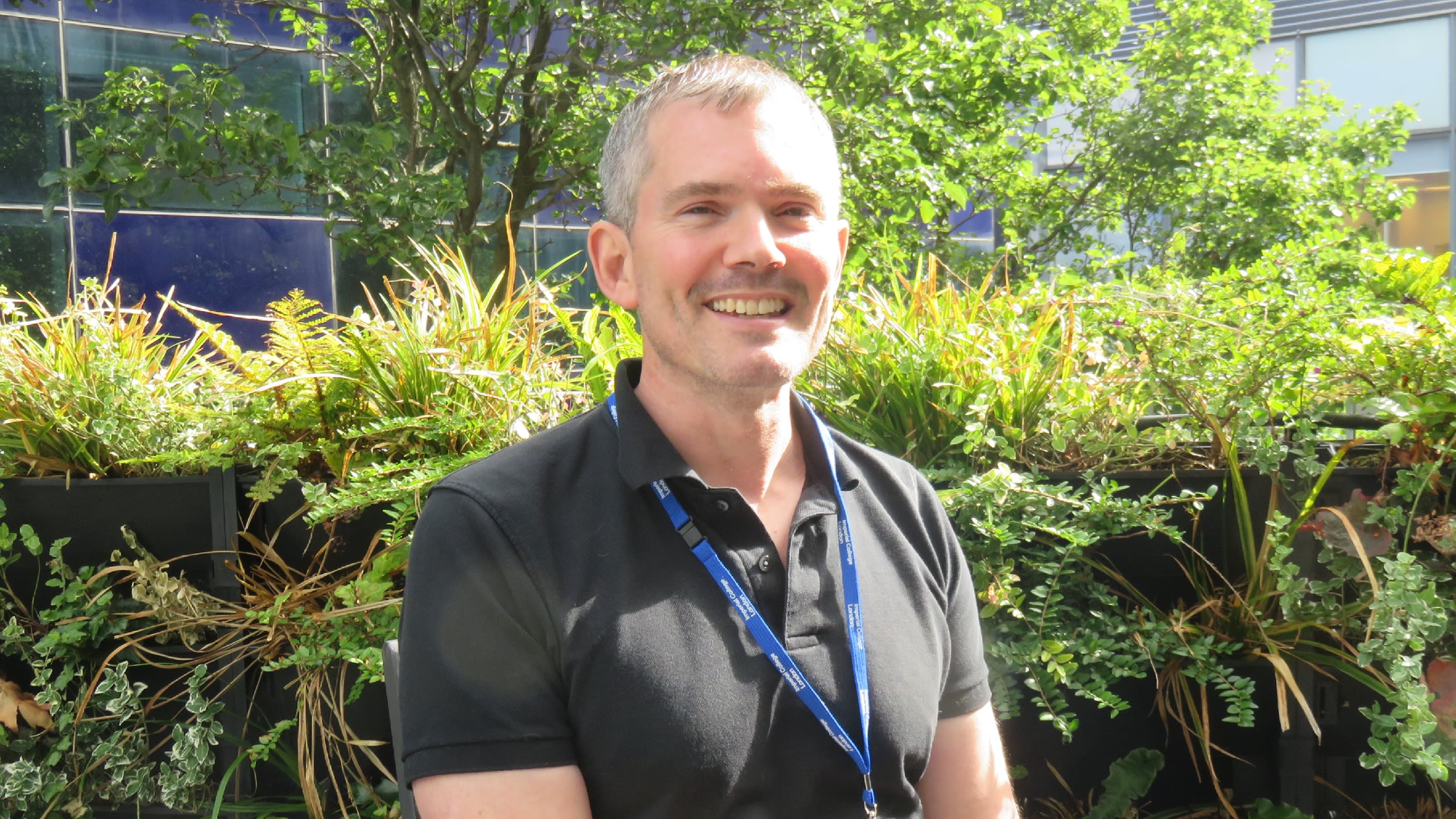 Mark Wilkinson in a green space on campus