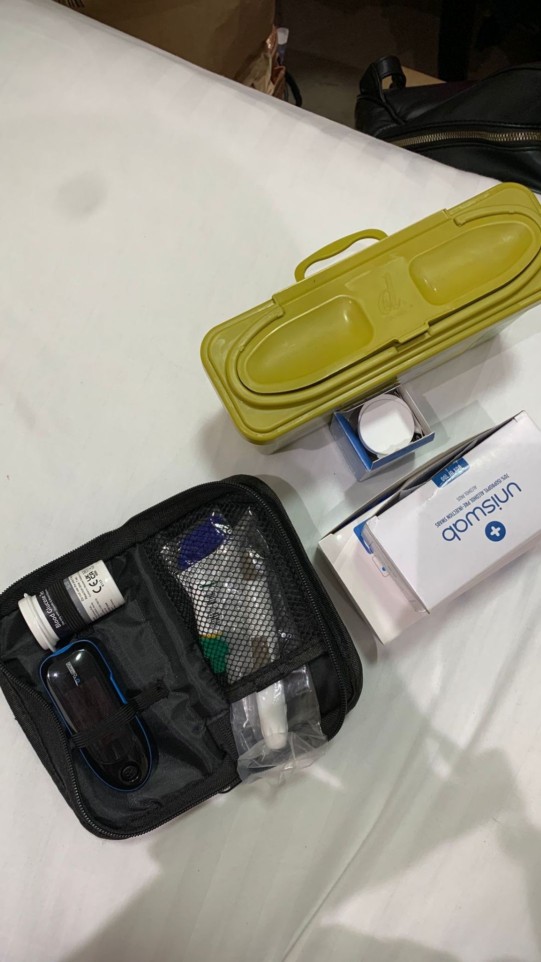 A blood glucose monitoring kit.