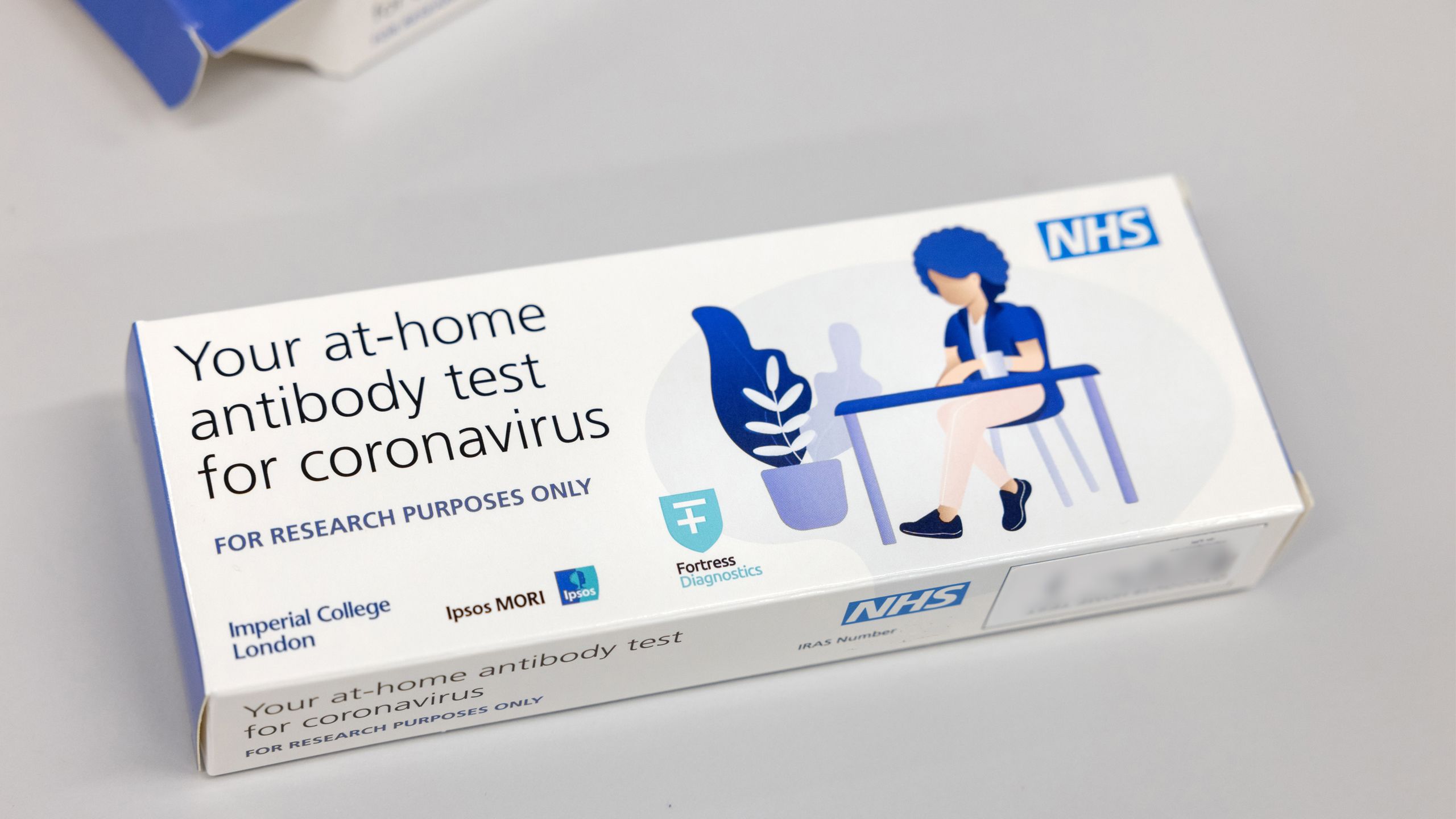 A packet containing a COVID-19 antibody testing kit